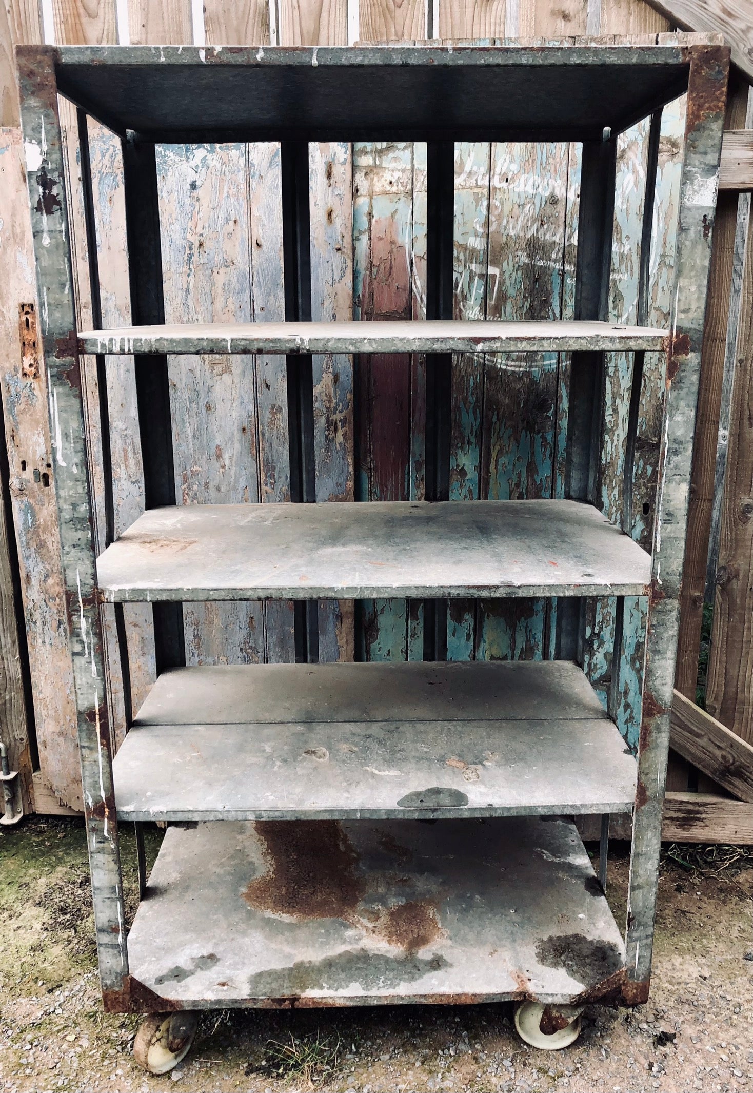 Old industrial wheeled trolley storage carts shelves