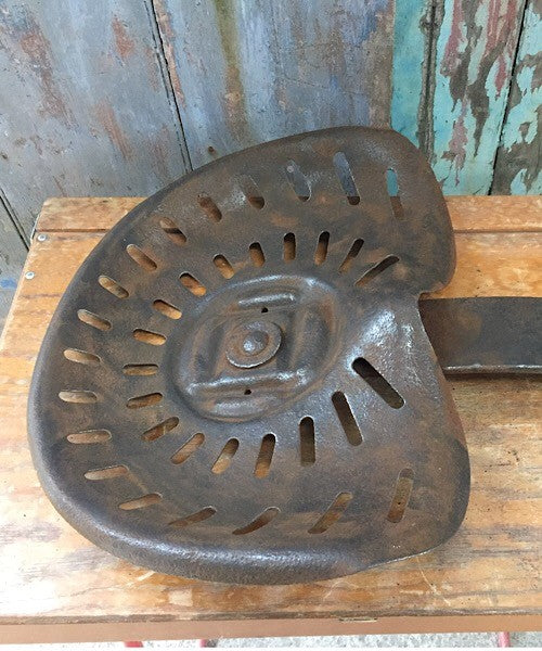 Vintage original cast iron tractor seat