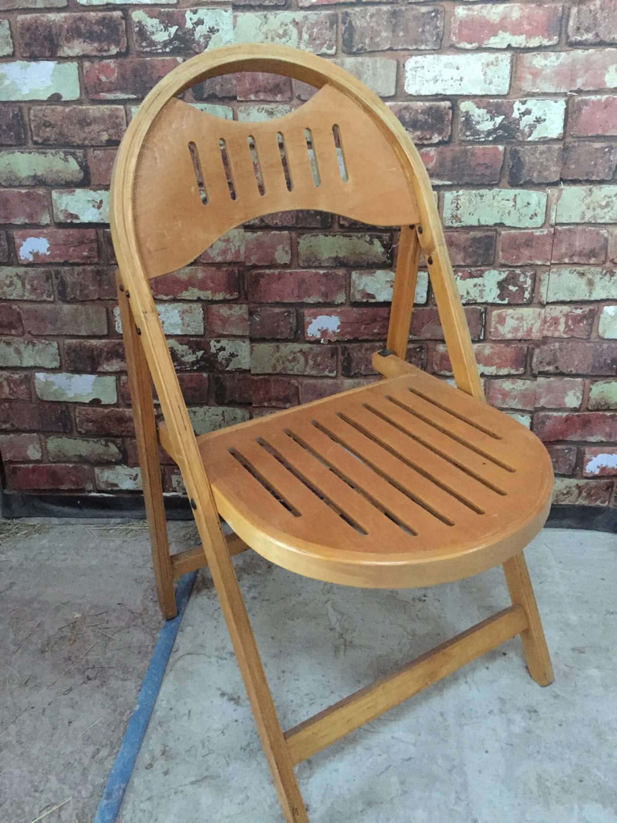 Vintage wooden folding chair seat round back